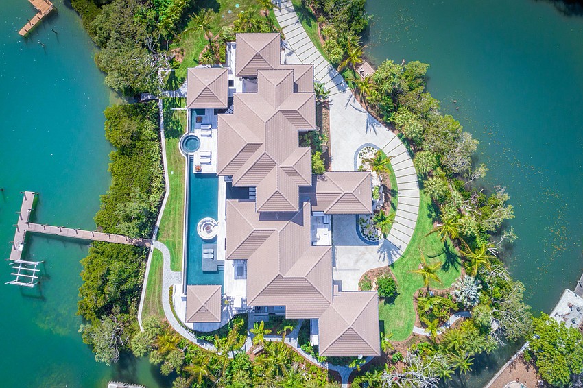 Water surrounds the property on three sides. (Photos courtesy: Premier Sotheby’s International Realty)