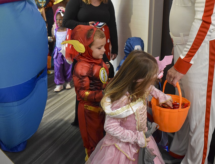 Children from Easterseals Southwest Florida trick-or-treat.