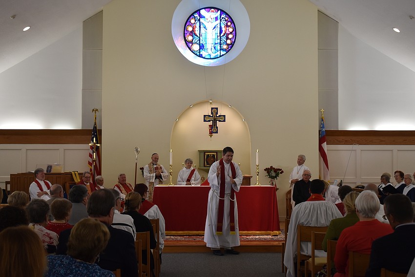 Father Dave Marshall speaks to his congregants.