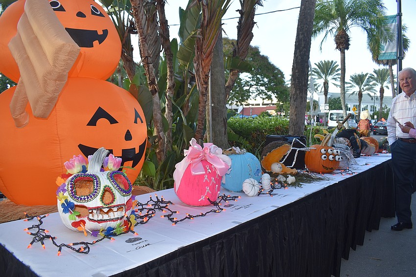 Decorated pumpkins slowed folks to a crawl as they stopped to take a peek.