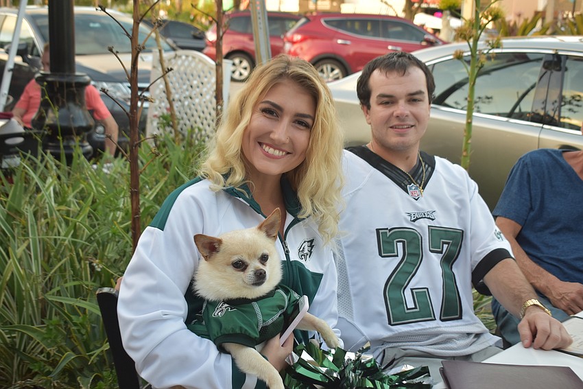 Kaitlin Dominach, Nevin Renaud and Biscuit.