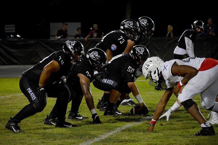 The Pirates offensive line stares down the competition.