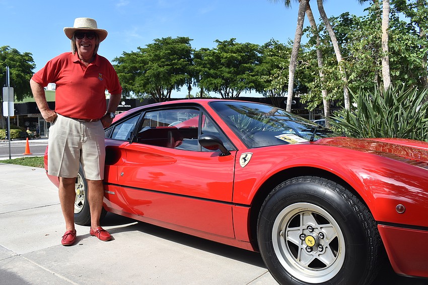 David Smee stands with his car.