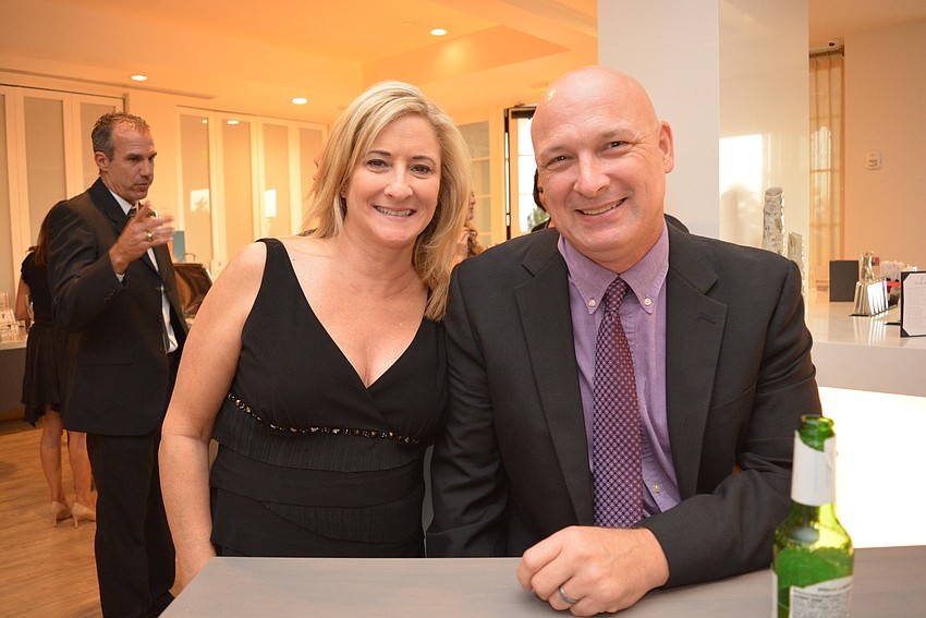 Parrish resident Pam Curran, with her husband Chuck Curran, attends as an employee of sponsor Neal Communities.