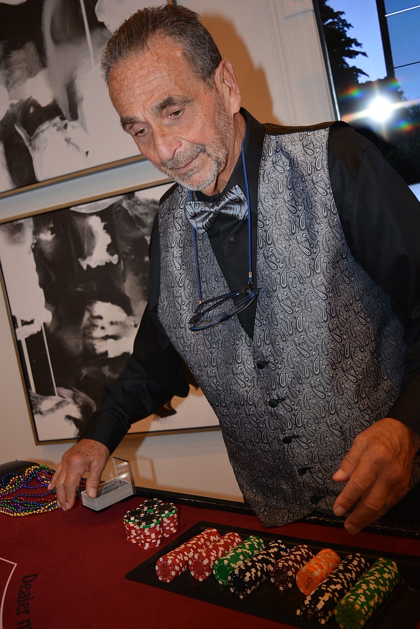 Jeff Golden deals out a game of blackjack.