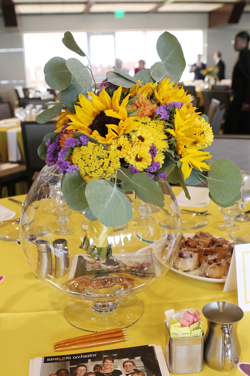Each table has a cheery centerpiece.