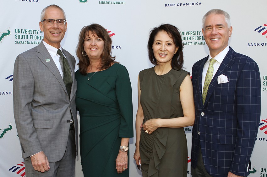 Mike and Tammy McCoy with Dr. Cheyenne Currall and USF President Steven Currall