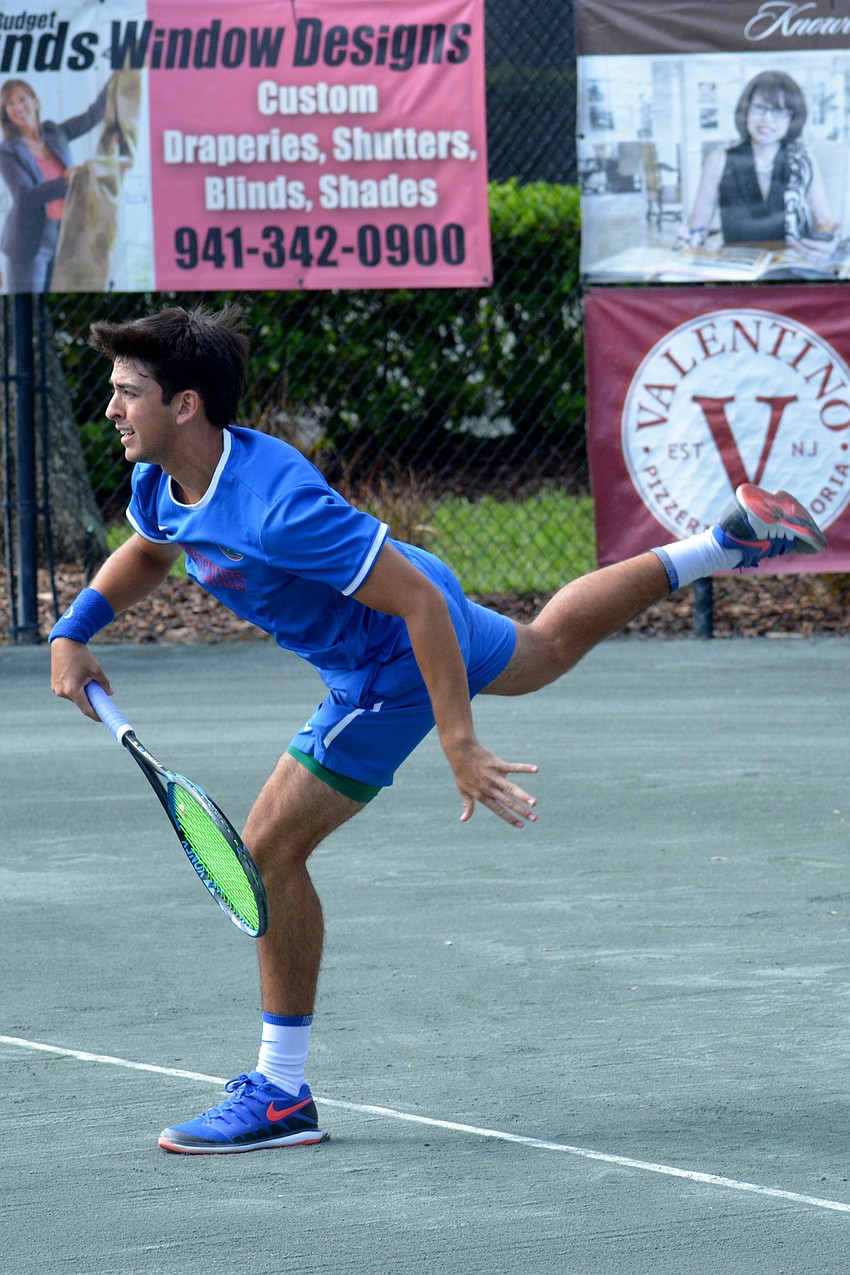Florida junior Andy Andrade fires a serve against Gators teammate Josh Goodger in the men's final. Andrade would take home the trophy.