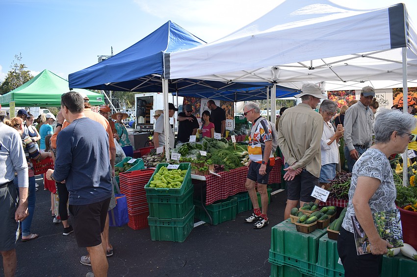 Opening day of the Market at Lakewood Ranch drew a huge crowd to the parking lot at Lakewood Ranch Medical Center.
