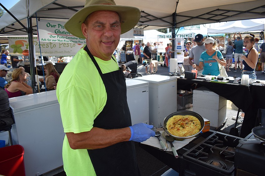 Presto Pesto owner Bob Garbowicz was cooking quickly for a line of customers.