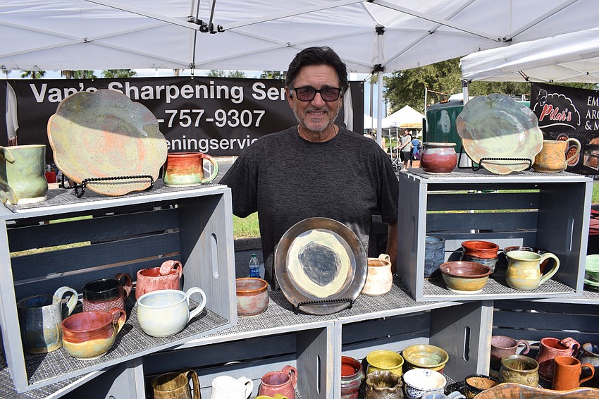 Van Balam, who had a knife sharpening booth at the market at the Sarasota Polo Club last year, has added his own handcrafted pottery this year.