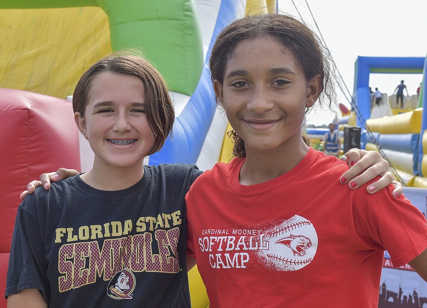 Michele Will, 13, and Raionna Clark, 12