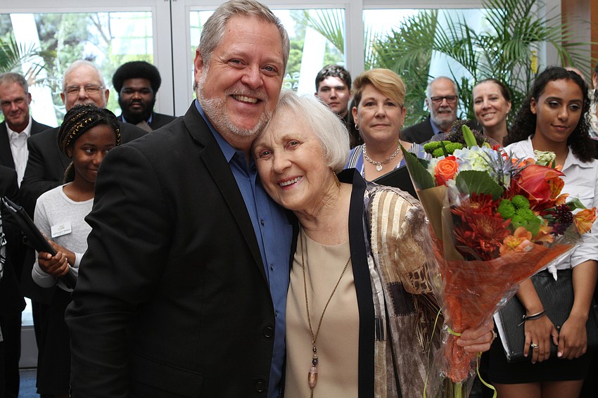 Artistic Director Joseph Caulkins recognized Nancy Morris for 29 years of service with Key Chorale.