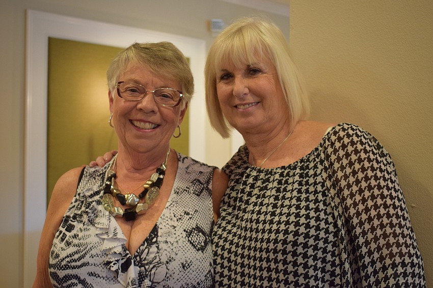 Tara residents Joyce Yancey and Anne Marie Cole talk about the fashion show.