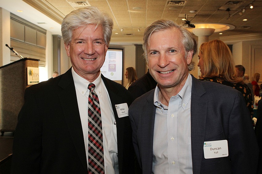 Pines of Sarasota president Mike Ward and Duncan Yull