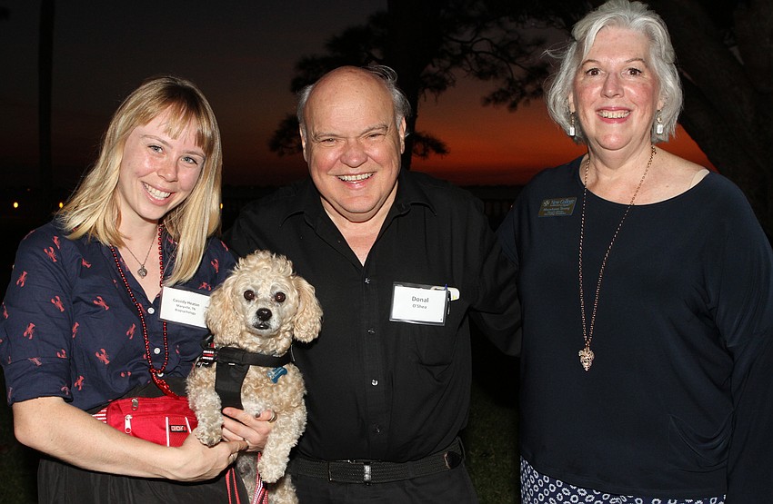 Cassidy Heaton, Chance the dog, George Quarterman and New College President Donal O'Shea and New College Foundation Executive Director MaryAnne Young