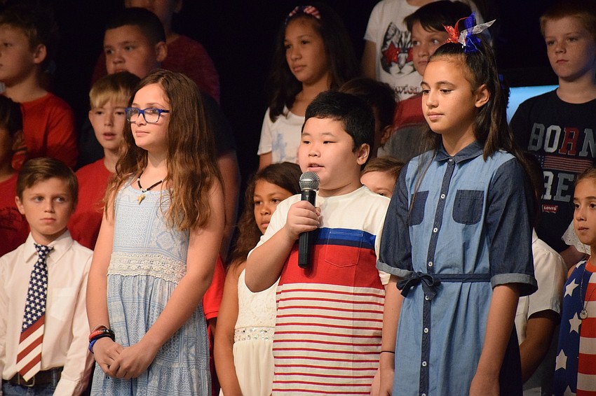 Fourth-graders Lilli Belyea, Jaywen Situ and Emma Cowart share facts about U.S. history.