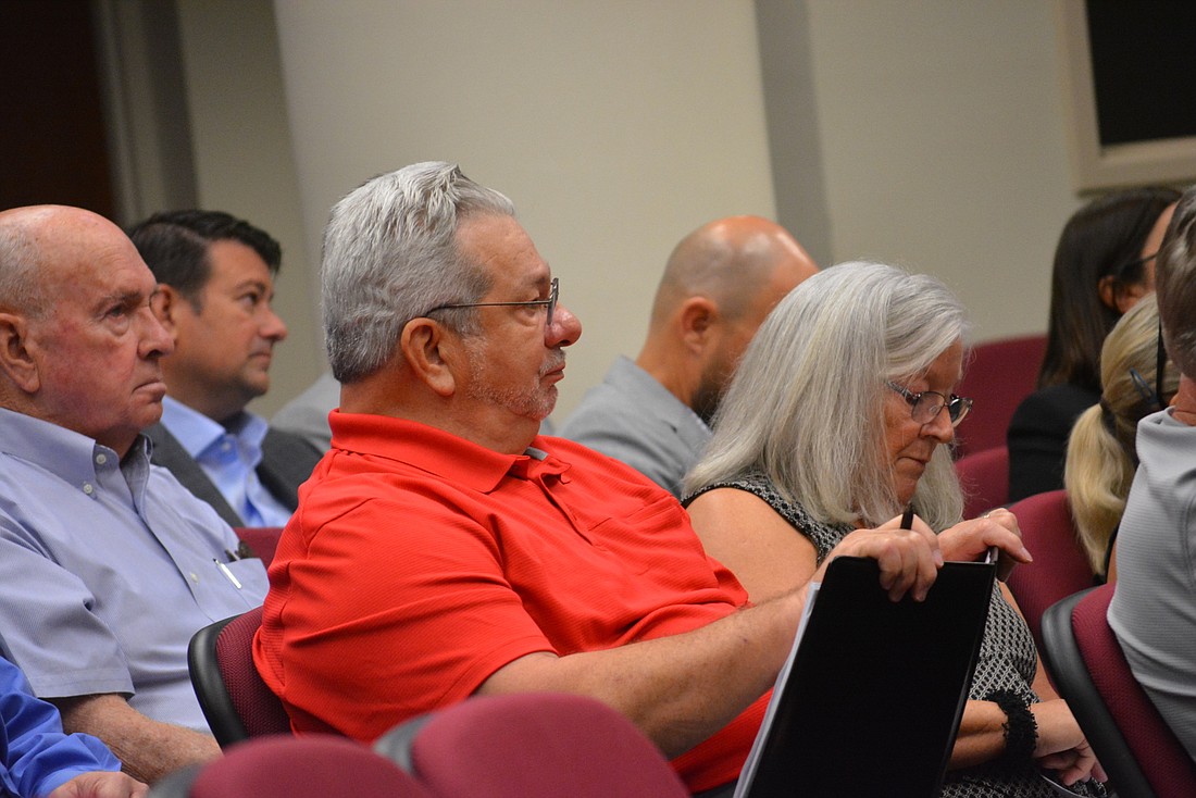 Tim Swanson listens to testimony about proposed changes to a project near his home in Fairfield during a Nov. 7 land-use meeting.
