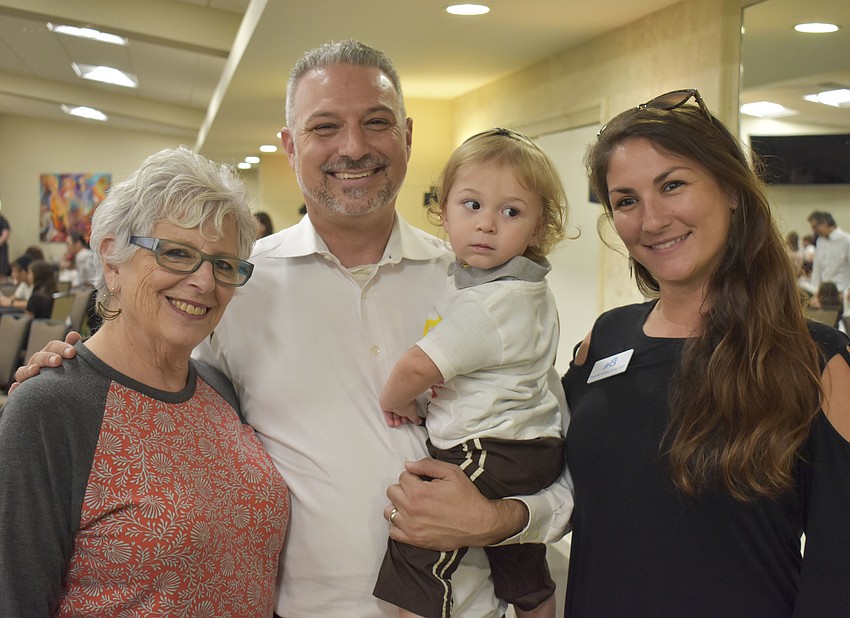 Rabbi Mini Weisel and Pamela Lasko with Rabbi Michael Shefrin and his son Jacob.