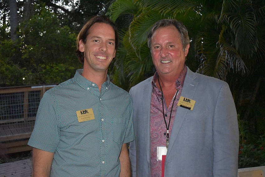 Evan Barniskis and 2017 chairman Michael Doll.