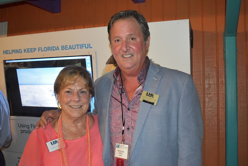 President Gail Loefgren and Michael Doll.