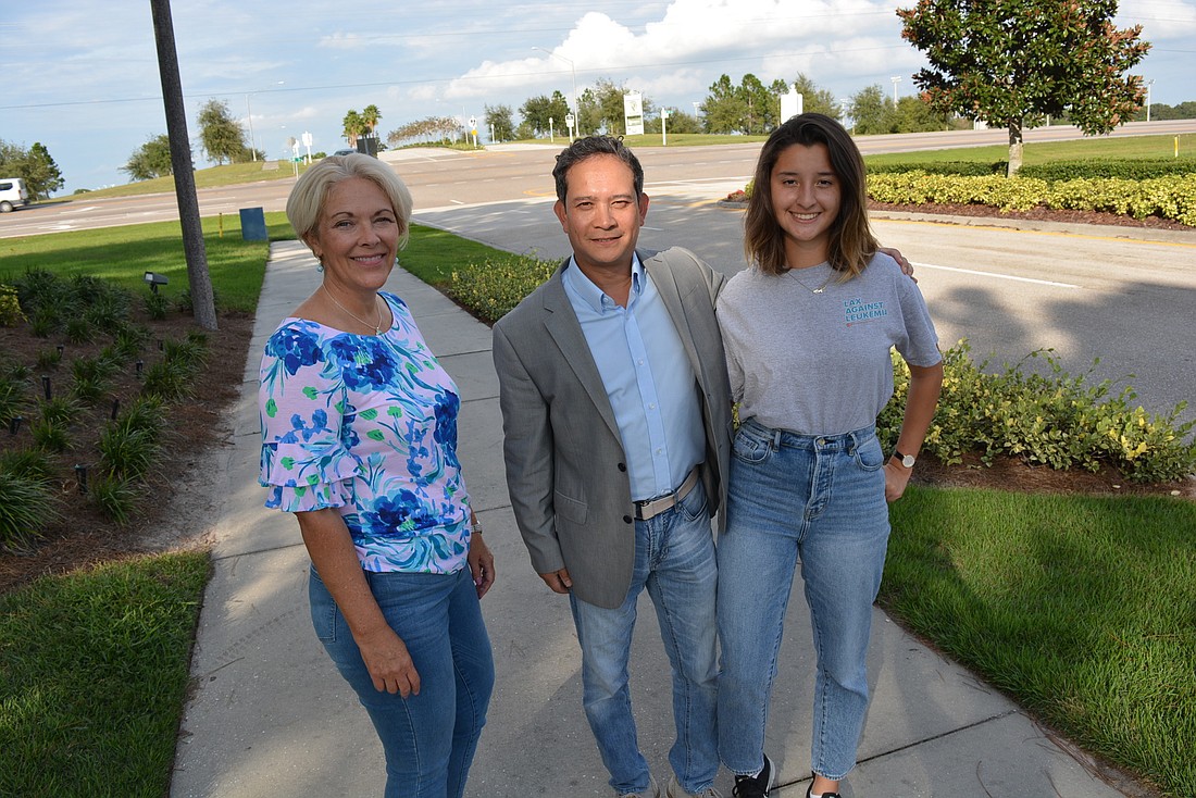Lakewood Ranch residents Sandy Williams and Tony Llamas, with his daughter, Meghan Llamas, worry about safety  at the intersection of Post/Greenbrook boulevards at State Road 70. They drive there daily for work and other needs.