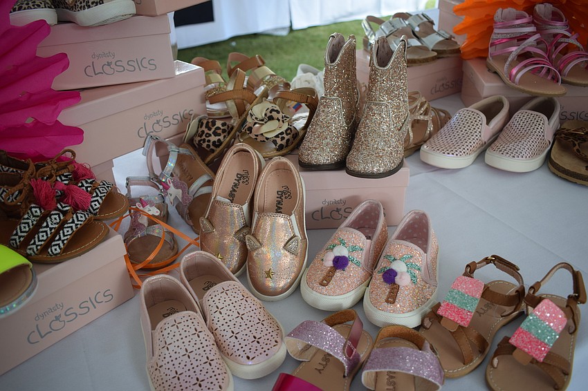 The silent auction items included plenty of little shoes.