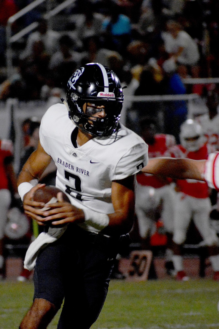 Pirates sophomore Shawqi Itraish scrambles for a first down.