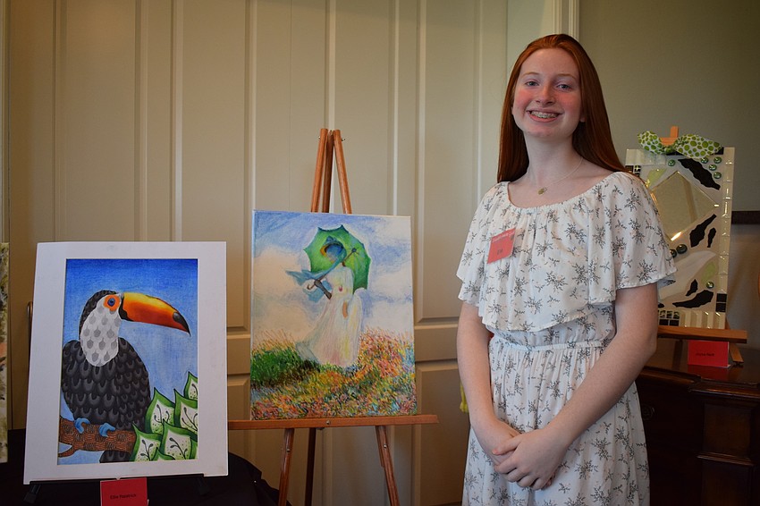 Ellie Raistrick, a freshman at Parrish Community High School, showcases her artwork for the first time. 