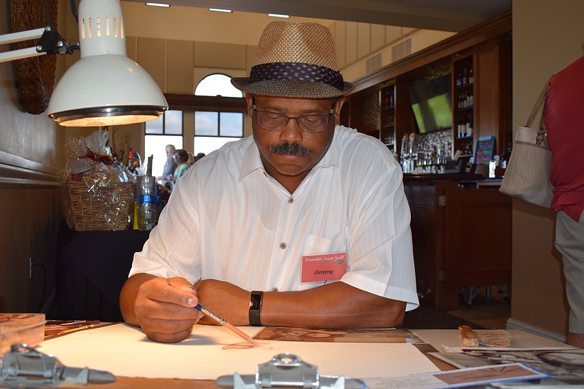 Jimmy Copeland works on a portrait during the Waterlefe Art Show. Copeland said the Waterlefe Artists Guild is a supportive group that provides inspiration and helps artists when they are struggling with one of their pieces.