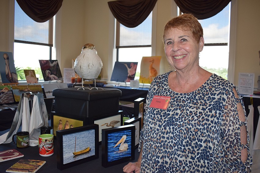 Patsy Hall, chairman of the Waterlefe Artists Guild, has photographs put on doormats, calendars and other items.