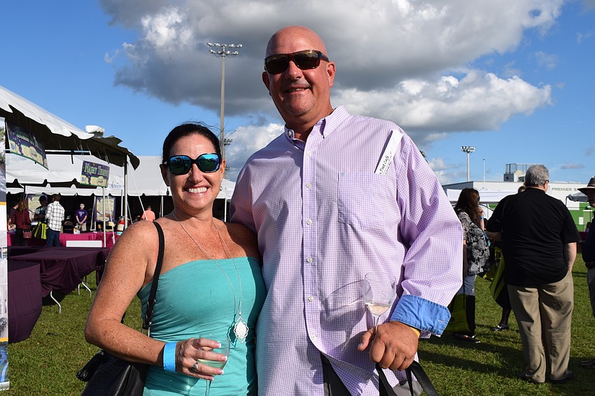 Sarasota's Shannon Haley and Lakewood Ranch's Jay Engstrom love the atmosphere and trying new wines and food at the Suncoast Food and Wine Fest.