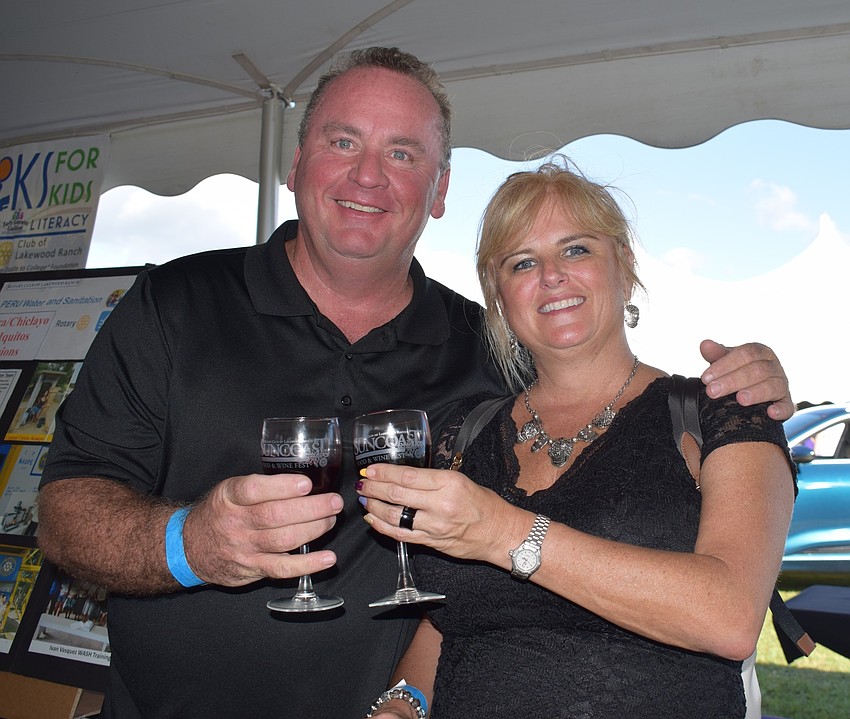 Chuck Swanson and Melissa Paukstis, both of Cape Coral, celebrate Paukstis' birthday at the Suncoast Food and Wine Fest.