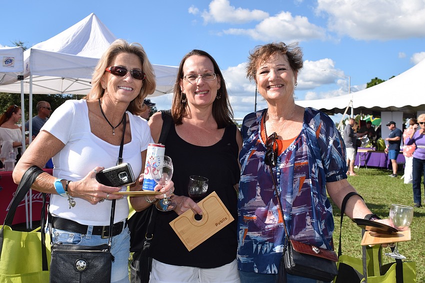 Tampa residents Kathy Coakley, Sharon Klein and Linda Walker enjoy their first time being at the Suncoast Food and Wine Fest.
