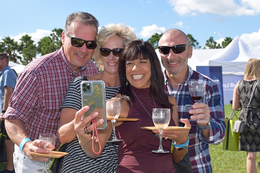East County residents Chris and Kristen DiBiase and Sharon and Pete Piotrowski take a selfie to commemorate their time at the Suncoast Food and Wine Fest. 