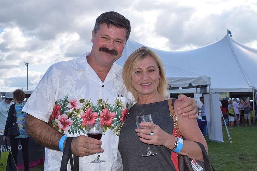Lakewood Ranch resident Nino Simunovic and Largo resident Anna Rice enjoy the festival. Simunovic said the festival is a chance to find new restaurants and to try different wines.