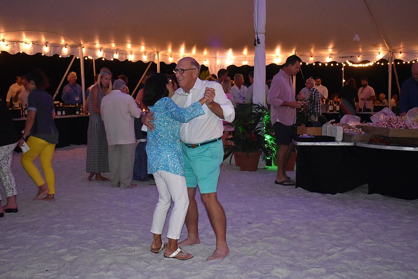 Ralph Harvey and Nancy Amberson start the dancing.