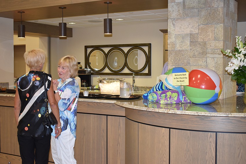 Judy Ebrahim and Gail Hetler catch up.