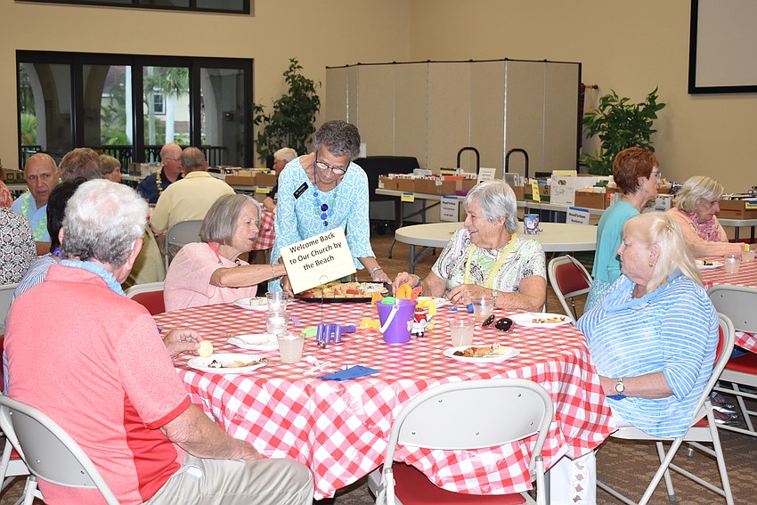 Sue Wertman delivers dessert.