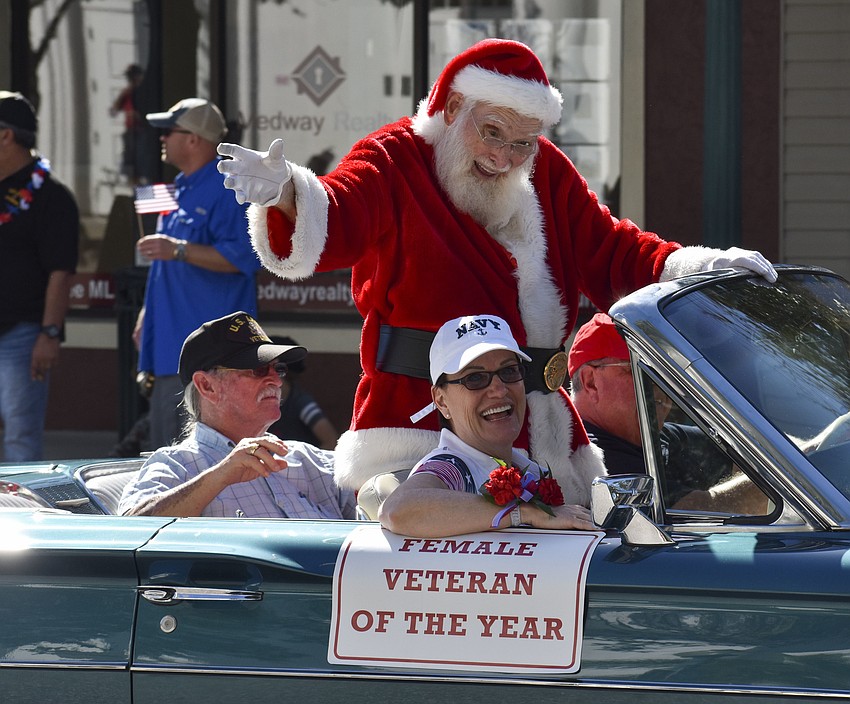 Santa Claus caught a ride along the parade route.