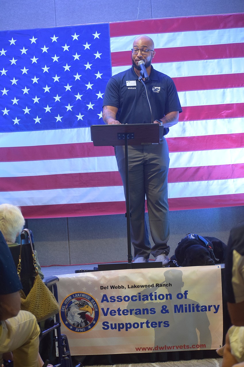 Southeastern Guide Dogs representative Sean Brown, an Army veteran, was the guest speaker during Del Webb's Veterans Day program.