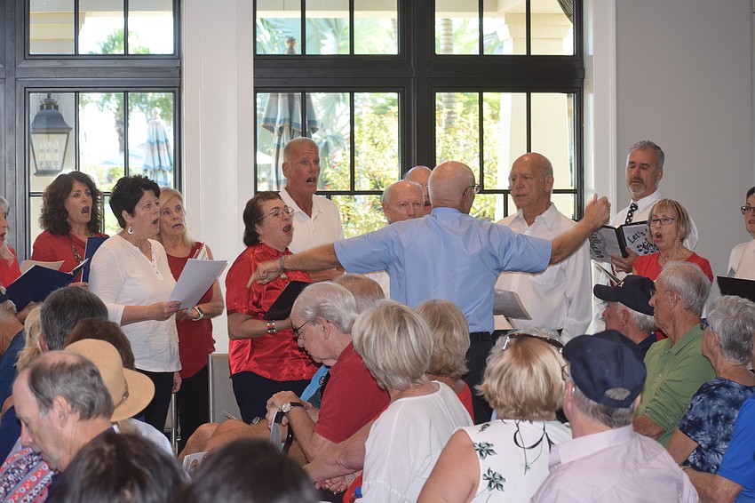 Angelo Truglio leads the Let's Sing choir of Del Webb.