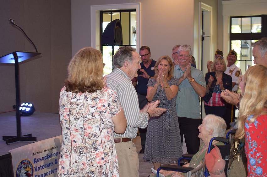 World War II veteran Reinhard Edward Bauer is honored at Del Webb.
