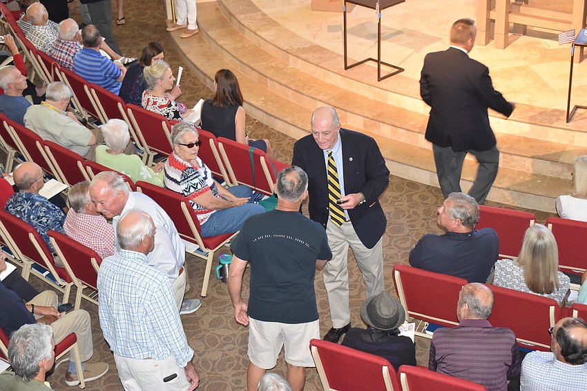 More stood to be recognized slowly.