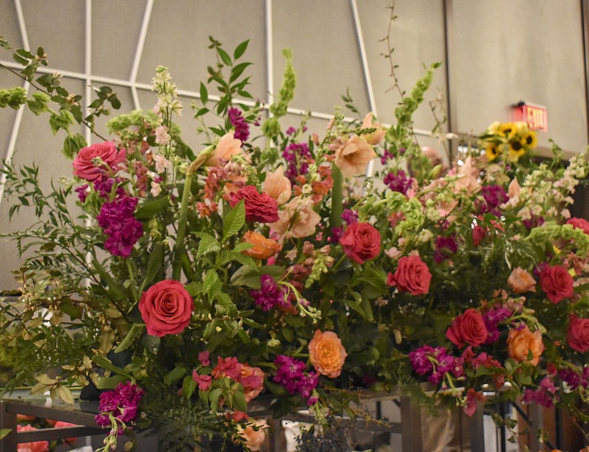 The floral arrangement that Kathy Rainer and Tricky Wolfes worked on during the luncheon.