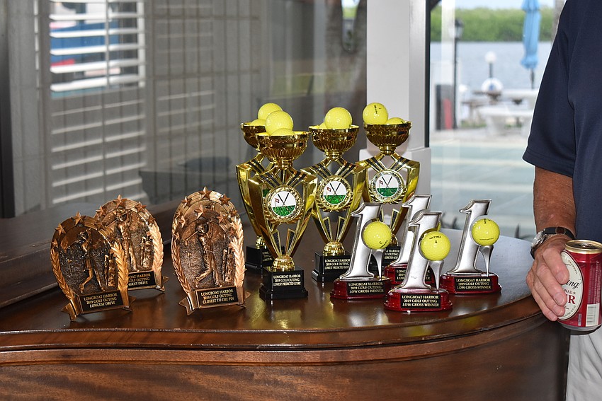 Golf awards await their recipients.