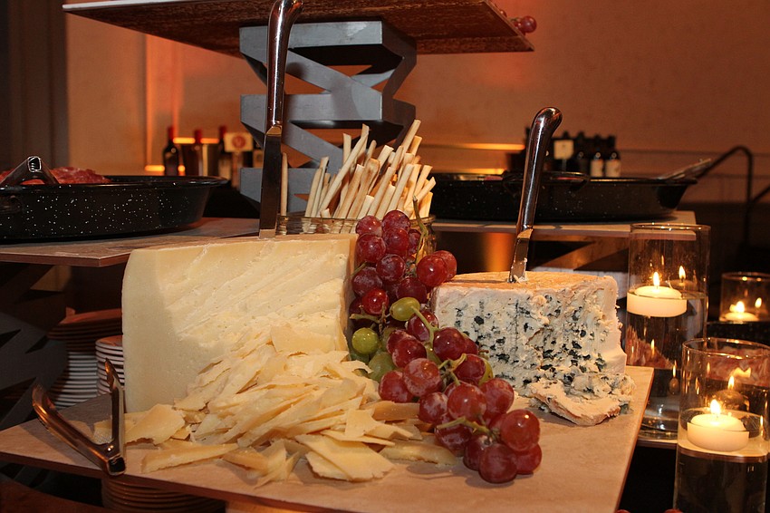 Guests picked up cheeses to pair with their wine