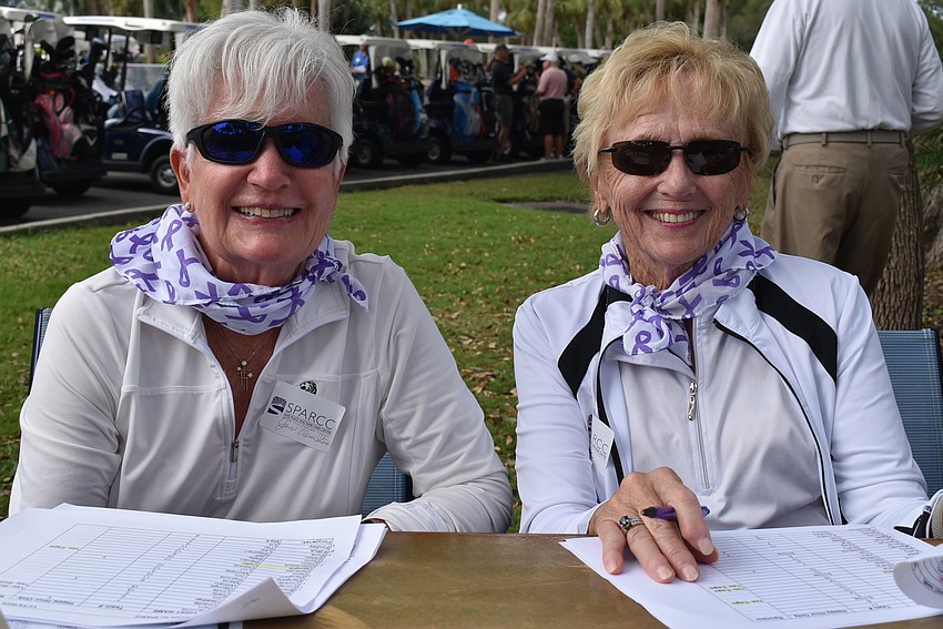 Jan Van Iten and Carol Westwood sign participants in to the event.