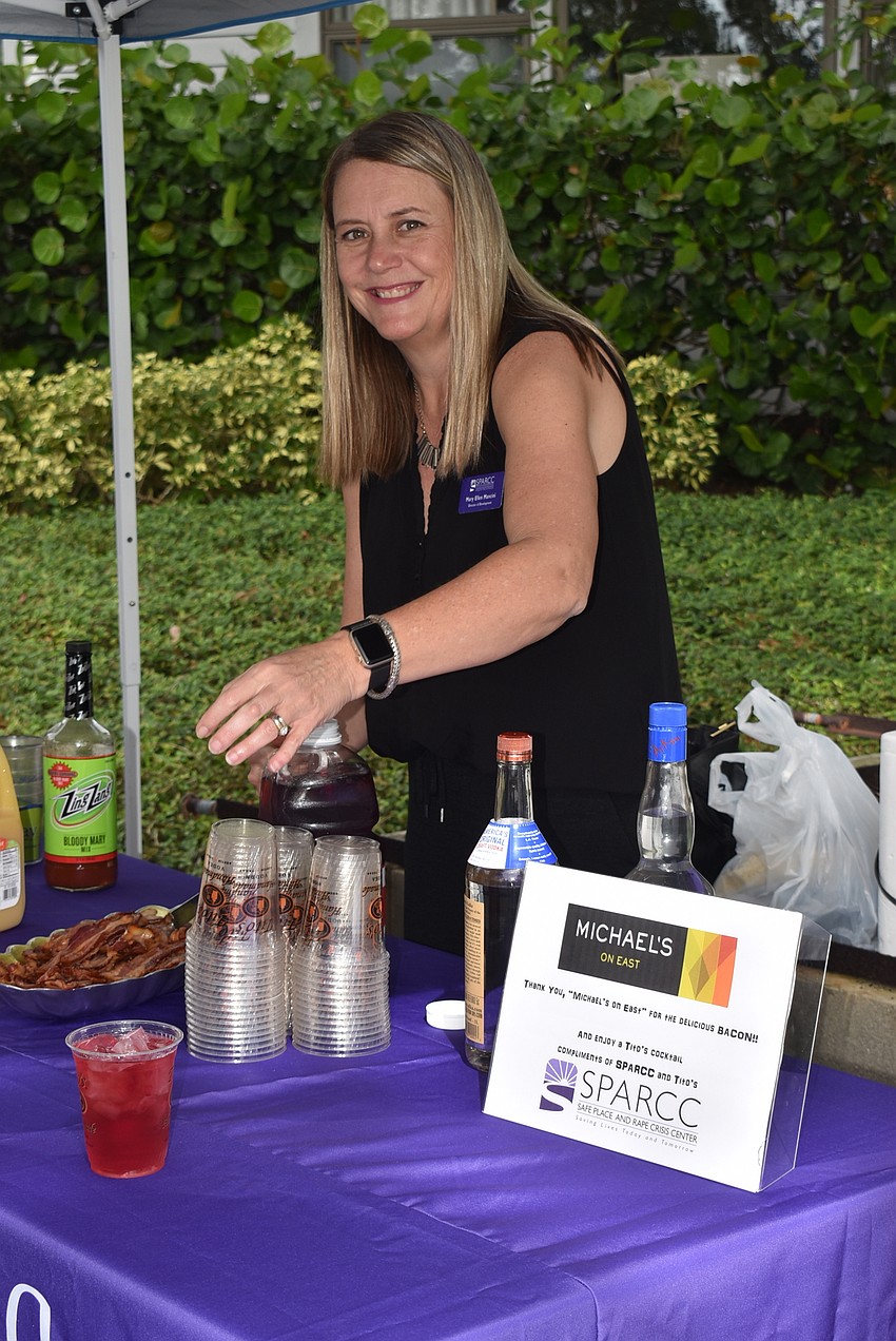 Mary Ellen Mancini serves up bloody marys.