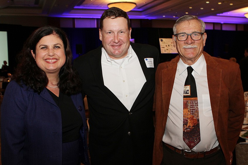 Executive Director Christine Robinson, President Keith Mercier and Jack Bispham